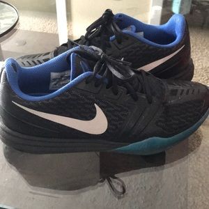 Blue and black nike kobes